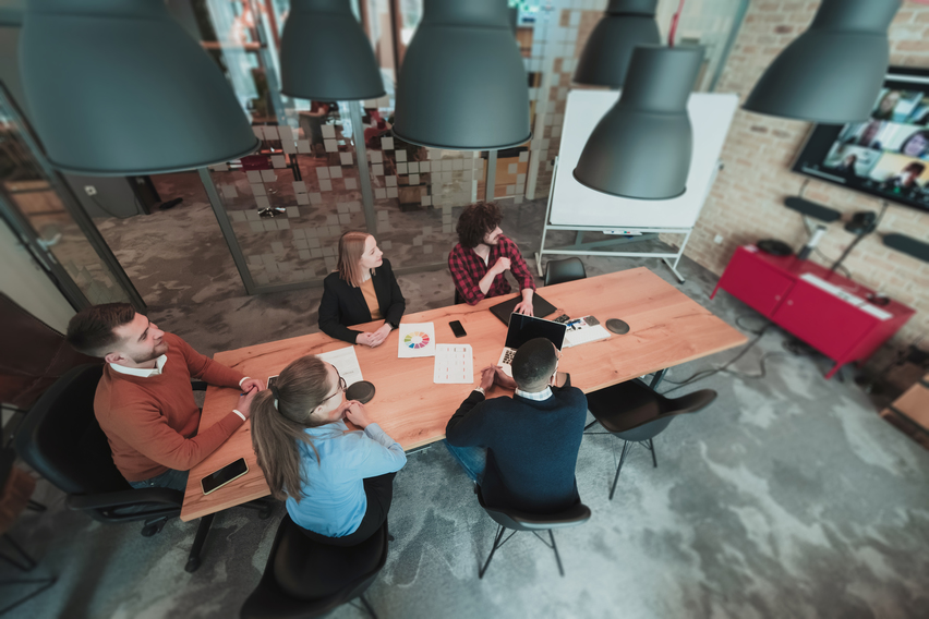 Startup team communicating together in a creative office